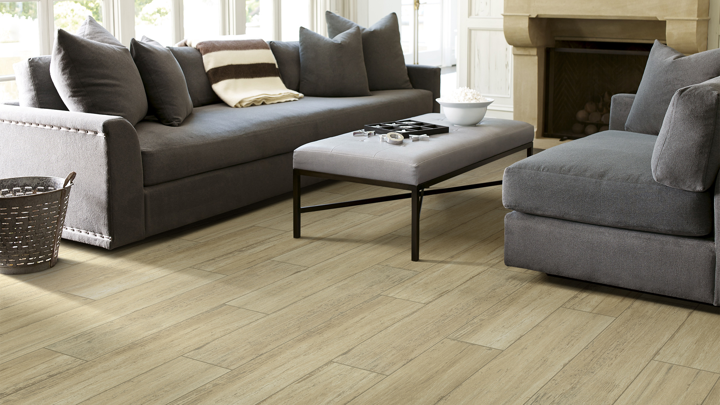 Wood-look tile in a living room, installation services available.