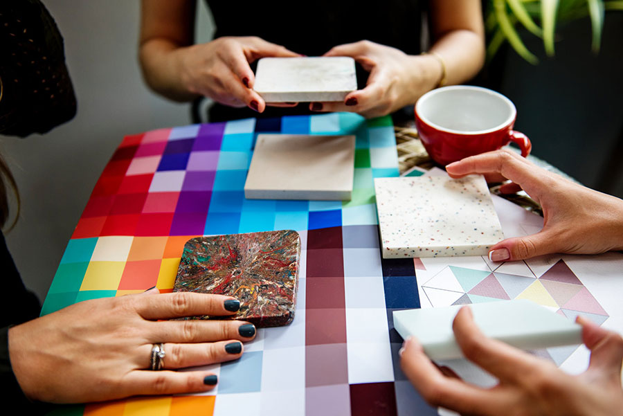 Interior designer showing tile samples